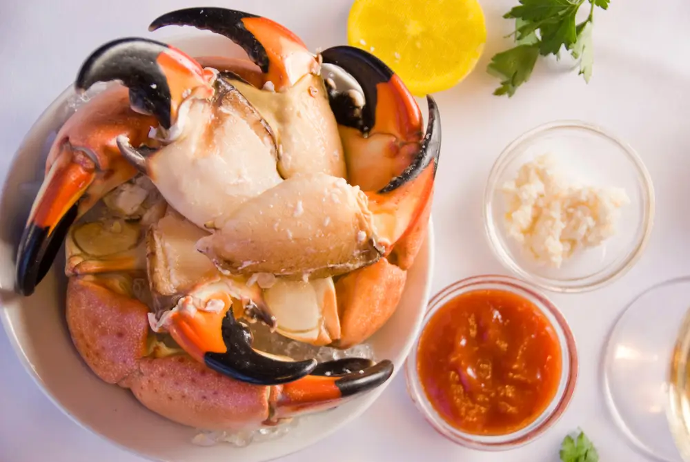 stone crab claws colossal served lemons